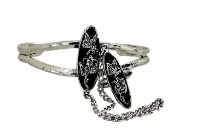 Armspange und Ring mit Rosen-Motiv