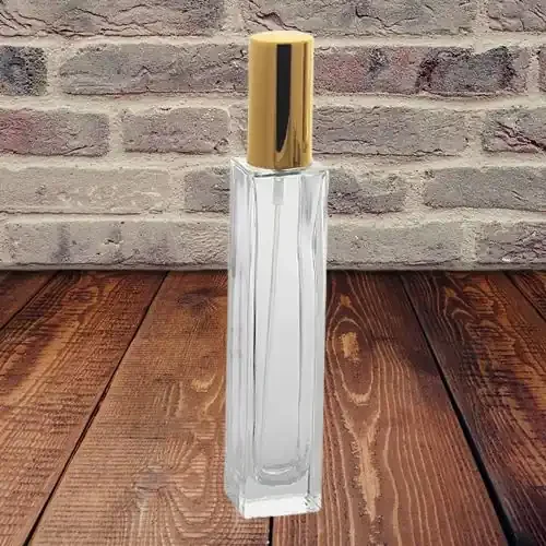 Parfümflasche klar mit goldenem Sprühkopf