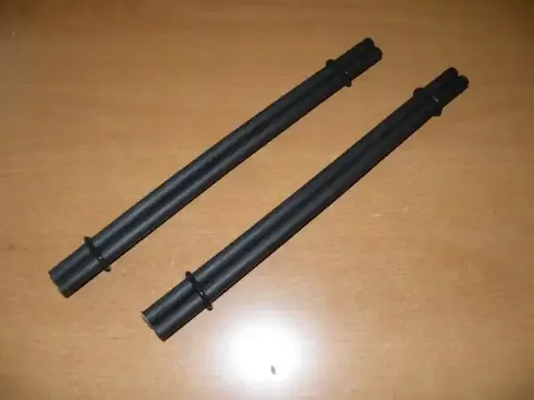 Schwarze Thai Sticks Gummiüberzogen